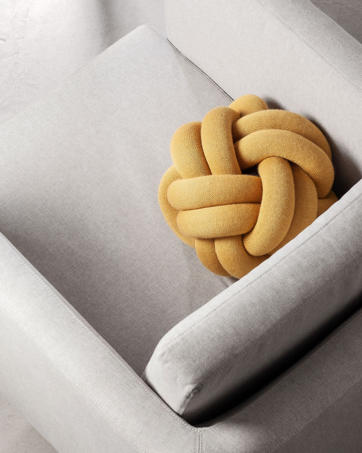 image2-2351-2000-KnotCushionYellow-Lifestyle