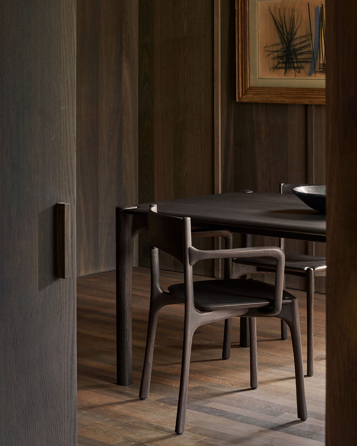Ethnicraft-PI-Dining-Chair-Armrests-Dark-Brown-Teak-Lifestyle